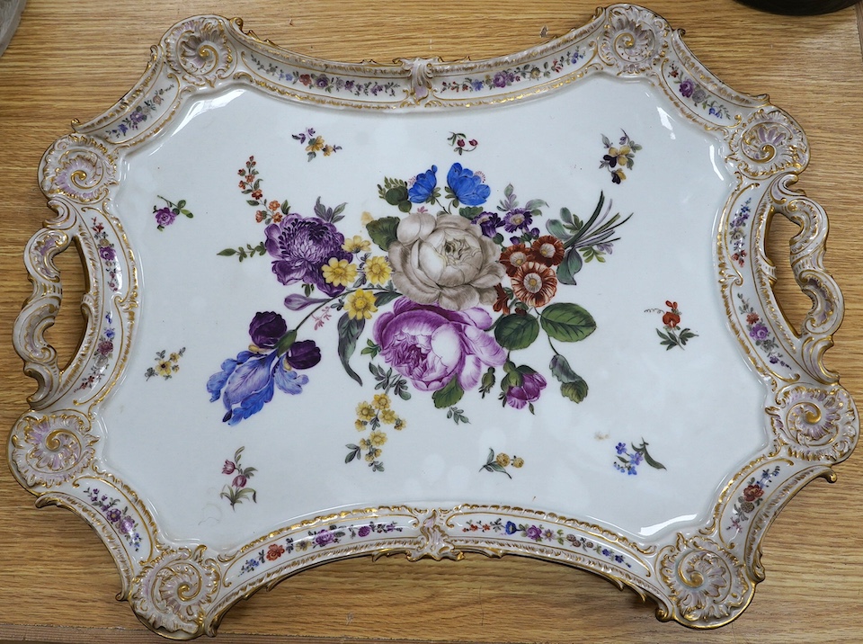 A large 19th century Dresden porcelain two handled tray, painted with a floral bouquet, 52cm. Condition - good